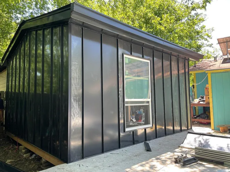 Black standing seam metal wall panels for Metal Roof Installation in Samsula-Spruce Creek