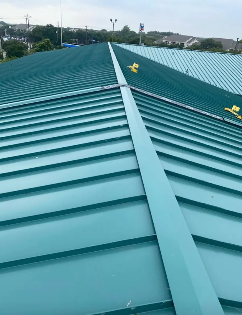 Green commercial metal roof ridge and valley for Metal Roof Repair in Samsula-Spruce Creek